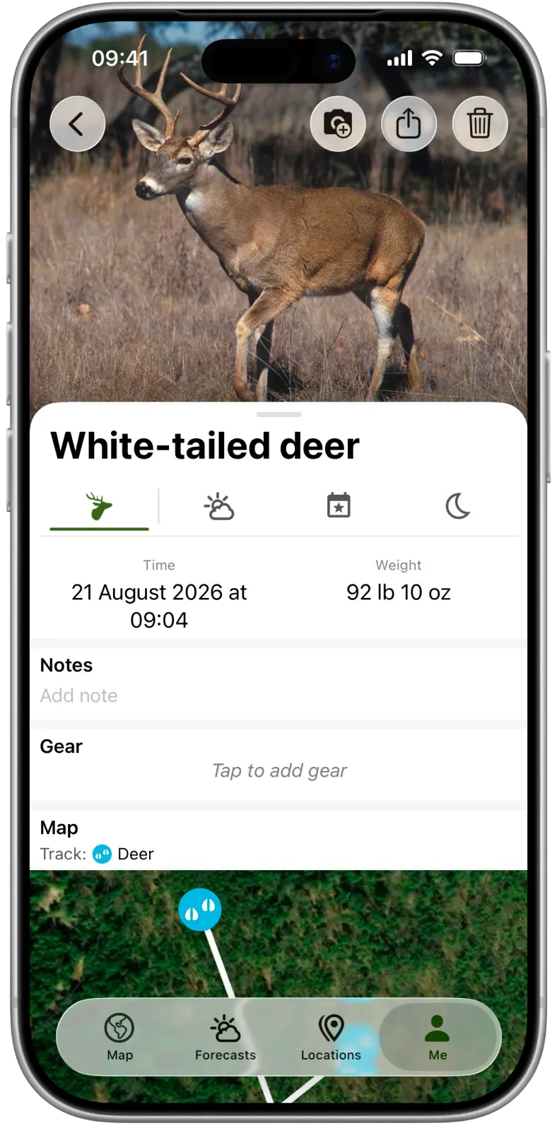 Un cerf de Virginie dans le carnet de chasse avec sa photo, la date, le poids, l'équipement et la carte